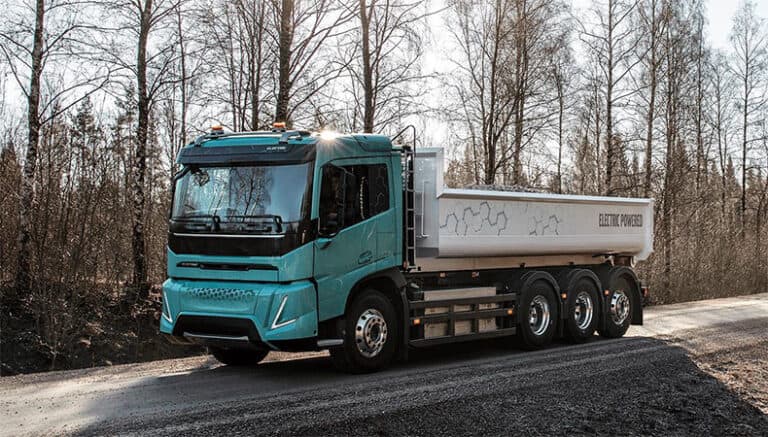A heavy-duty truck on the highway.